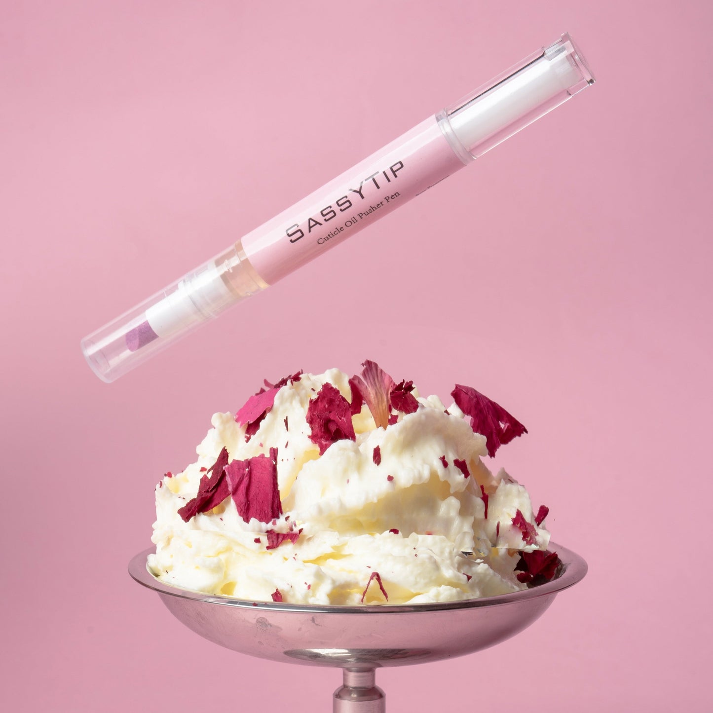 Close-up of SassyTip Cuticle Pusher Pen 2.0 tip, designed for gentle exfoliati