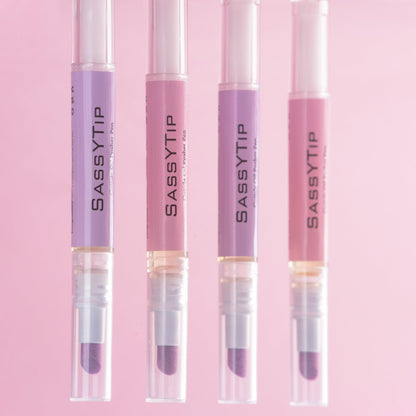 Activating SassyTip Cuticle Pusher Pen 2.0 to release nourishing cuticle oil